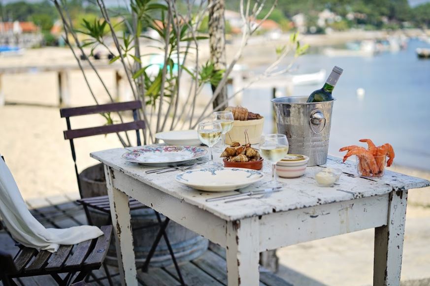 Seaside picnic with bordeaux wine